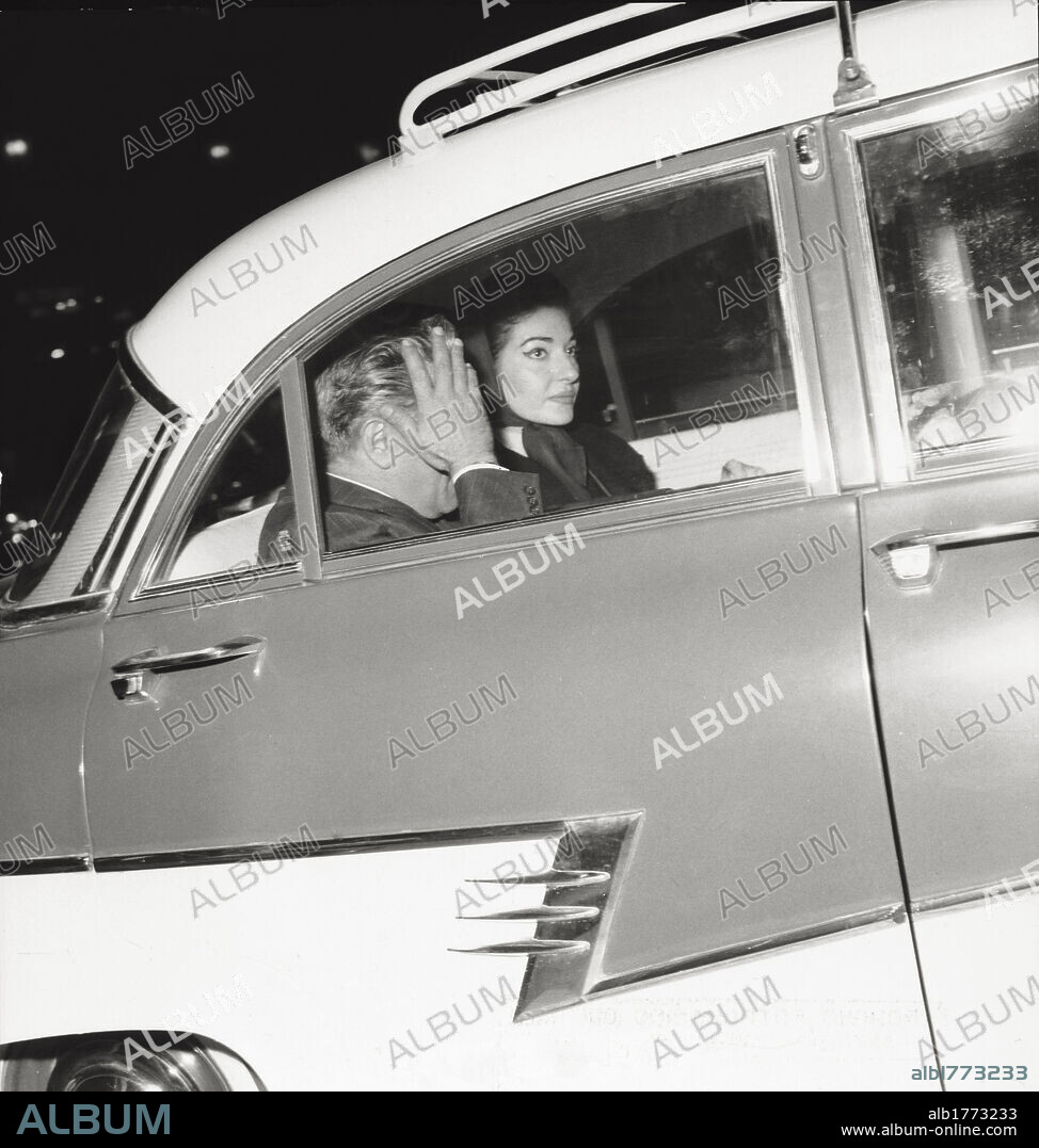 Aristoteles Onassis with Maria Callas. The American soprano Maria Callas sitting in the car together with the Greek shipowner Aristoteles Onassis. Italy, 1959.