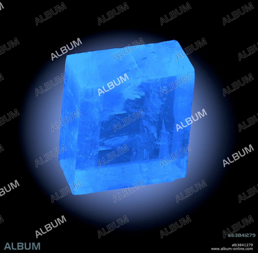 Calcite under UV light. Calcite is a carbonate mineral and the most stable polymorph of calcium carbonate (CaCO3). It is also fluorescent, as seen here.