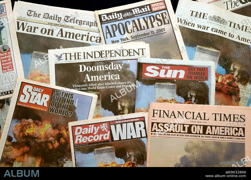Newspapers reporting on the 9/11 attacks in New York.