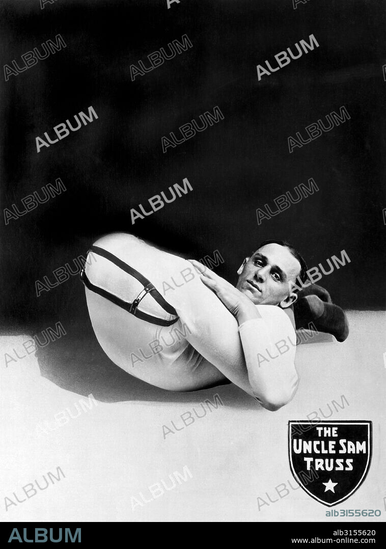 Buffalo, New York:  c. 1920. A contortionist puts his legs behind his back in an ad for the Uncle Sam Truss Company.