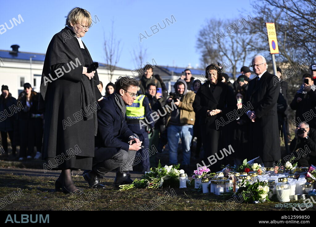 Sweden's Prime Minister Ulf Kristersson with his wife Birgitta Ed, King Carl Gustaf and Queen Silvia visit the memorial site where mourners placed candles and flowers outside Campus Risbergska School in Örebro, Sweden, February 5, 2025, the day after the school shooting in which at least 11 people lost their lives. Photo: Anders Wiklund / TT / Code 10040.