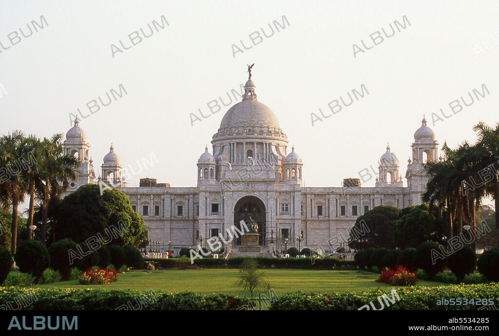 The Victoria Memorial Hall was built between 1906 and 1921 and is dedicated to the memory of Queen Victoria (1819–1901), Empress of India. The memorial was built in an Indo-Saracenic revivalist style and the architect was William Emerson (1843 - 1924). The tax records of Mughal Emperor Akbar (1584–1598) as well as the work of a 15th century Bengali poet, Bipradaas, both mention a settlement named Kalikata (thought to mean ‘Steps of Kali’ for the Hindu goddess Kali) from which the name Calcutta is believed to derive. In 1690 Job Charnock, an agent of the East India Company, founded the first modern settlement in this location. In 1698 the company purchased the three villages of Sutanuti, Kolikata and Gobindapur. In 1727 the Calcutta Municipal Corporation was formed and the city’s first mayor was appointed. In 1756 the Nawab of Bengal, Siraj ud-Daulah, seized Calcutta and renamed the city Alinagar. He lost control of the city within a year and Calcutta was transferred back to British control. In 1772 Calcutta became the capital of British India on the orders of Governor Warren Hastings. In 1912 the capital was transferred to New Delhi while Calcutta remained the capital of Bengal. Since independence and partition it has remained the capital and chief city of Indian West Bengal.
