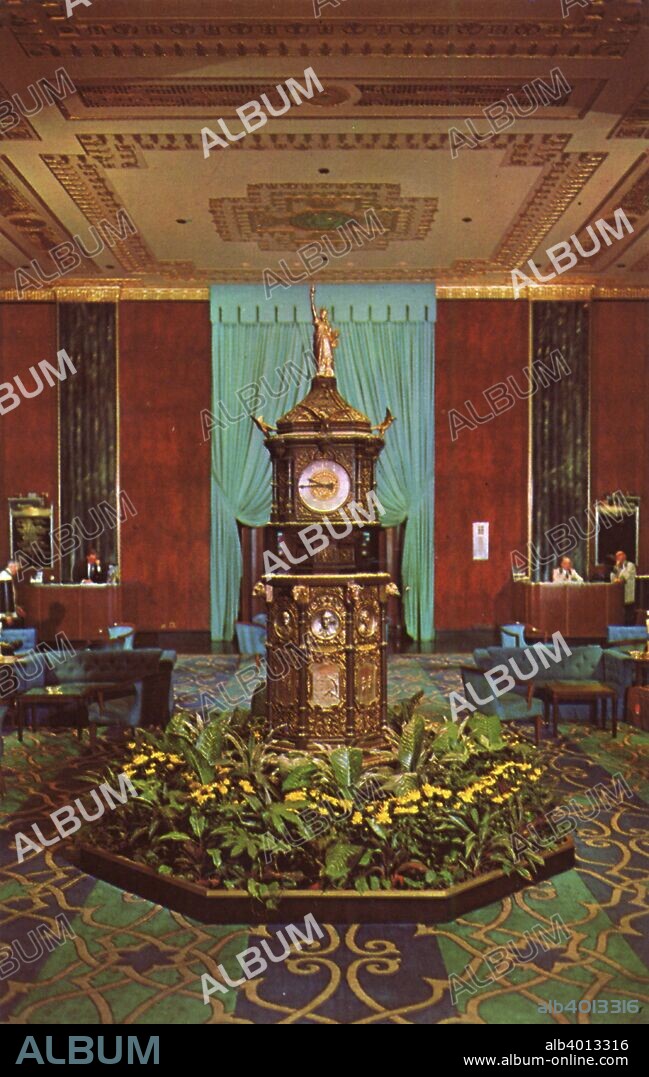 Lobby of the Waldorf-Astoria Hotel, New York City, New York, USA, 1965.  Vintage postcard showing the interior of the main lobby of the Waldorf-Astoria Hotel and its unique nine foot, bronze Waldorf Clock. The building was designed in Art Deco style by Schultze and Weaver and was completed in 1931. The hotel had previously occupied the Fifth Avenue site on which the Empire State Building stands.