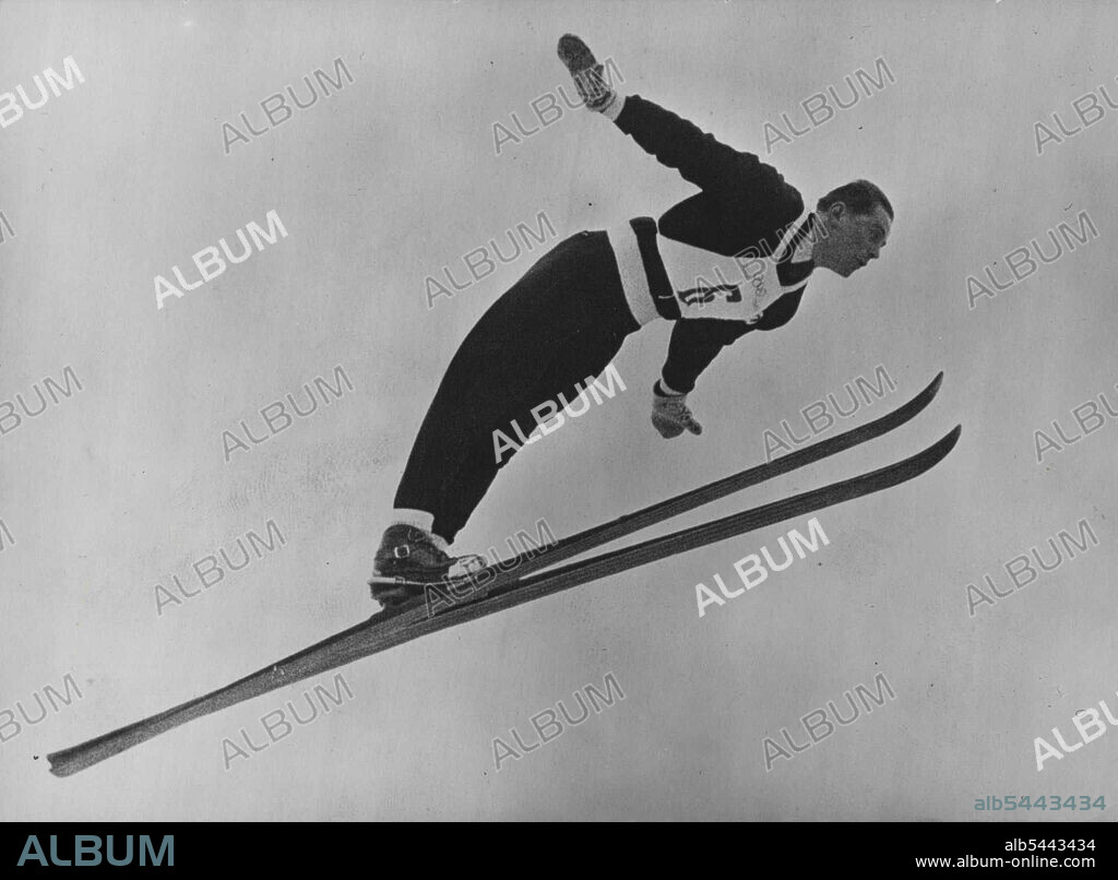 The Winter Olympic Games - Gold Medalist Aloft - Arnfinn Bergmann (Norway) won the Olympic Gold Medal by his ski-jump on February 24th. Here he is Aloff during his victory jump at Holmenkollen, Oslo. February 27, 1952. (Photo by Paul Popper).
