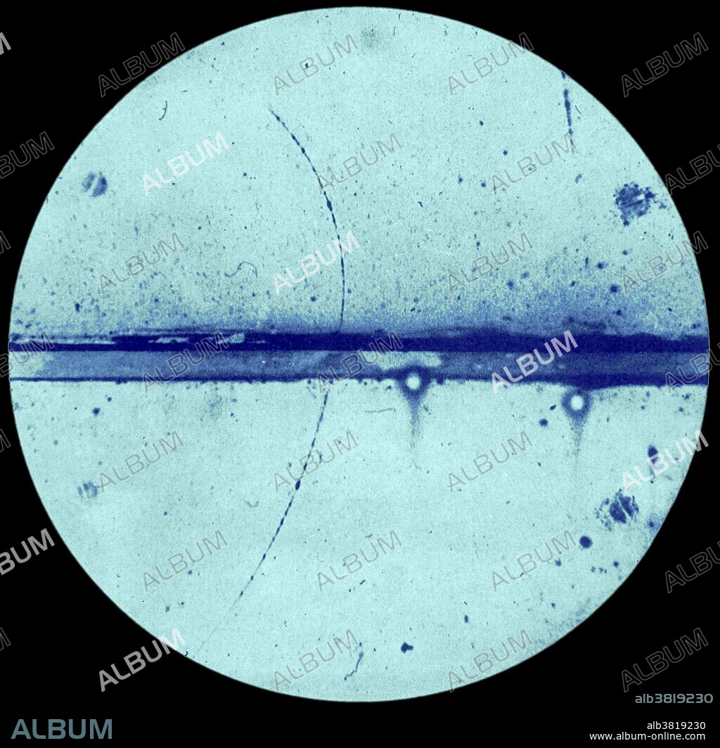 First evidence existence of positron single track antiparticle of electron from California Institute of Technology; Cloud Chamber; adduced by C.D. Anderson's photo, 1932. Carl David Anderson (September 3, 1905 - January 11, 1991) was an American physicist. Under the supervision of Robert Millikan, he began investigations into cosmic rays during the course of which he encountered unexpected particle tracks in his cloud chamber photographs that he correctly interpreted as having been created by a particle with the same mass as the electron, but with opposite electrical charge. This discovery, announced in 1932 and later confirmed by others, validated Paul Dirac's theoretical prediction of the existence of the positron. For this work, Anderson shared the 1936 Nobel Prize in Physics with Victor Hess. Also in 1936, Anderson and his first graduate student, Seth Neddermeyer, discovered the muon (mu-meson), a subatomic particle 207 times more massive than the electron, but with the same negative electric charge and spin 1/2 as the electron, again in cosmic rays. He spent all of his academic and research career at Caltech. He died in 1991 at the age of 85.