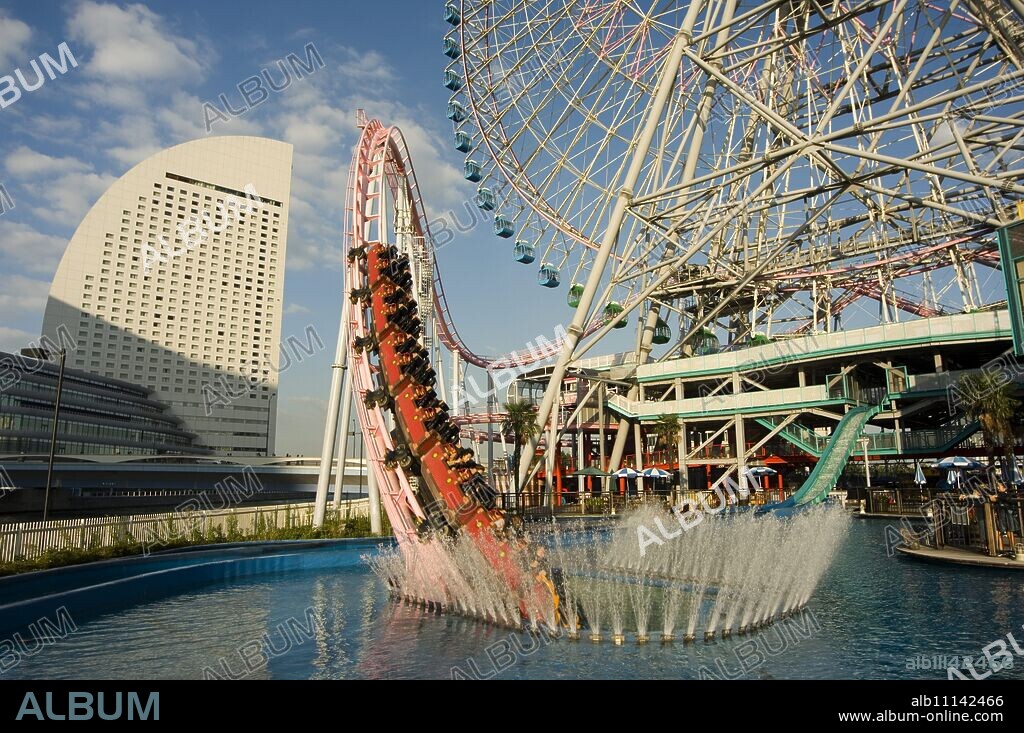 Rollercoaster and fun fair amusement park, Minato Mirai, Yokohama, Japan, Asia.