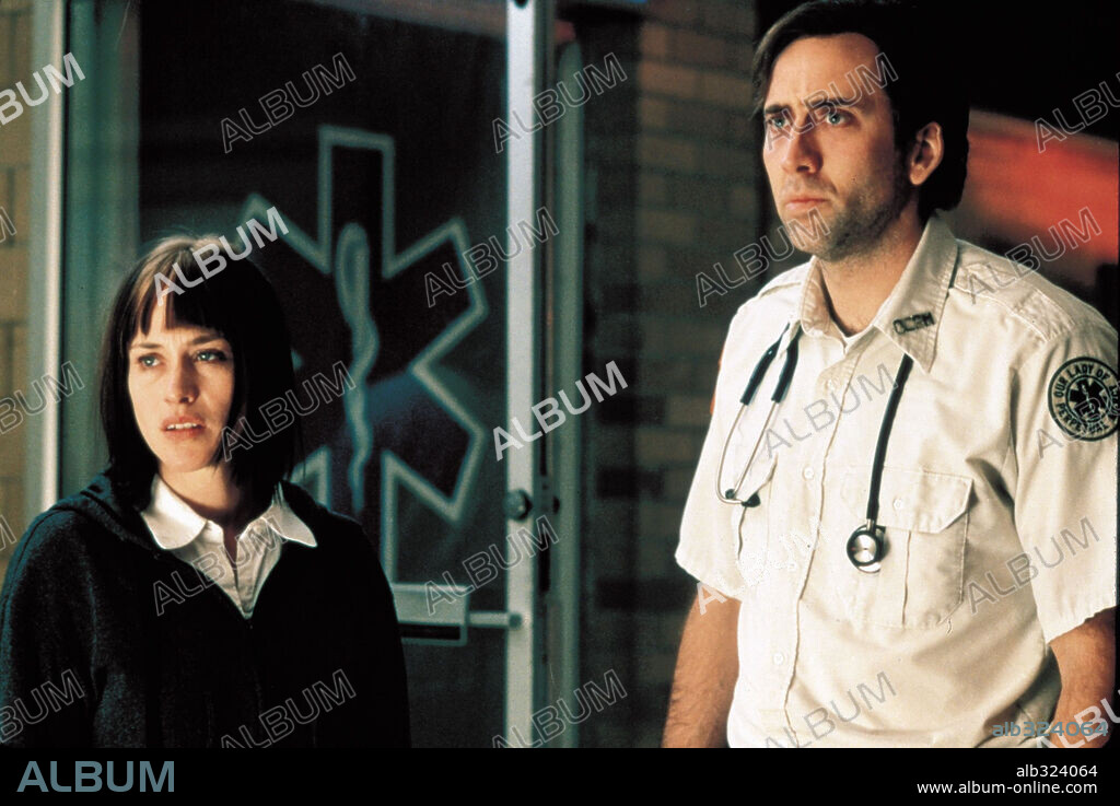 NICOLAS CAGE und PATRICIA ARQUETTE in BRINGING OUT THE DEAD, 1999, unter der Regie von MARTIN SCORSESE. Copyright TOUCHSTONE PICTURES.