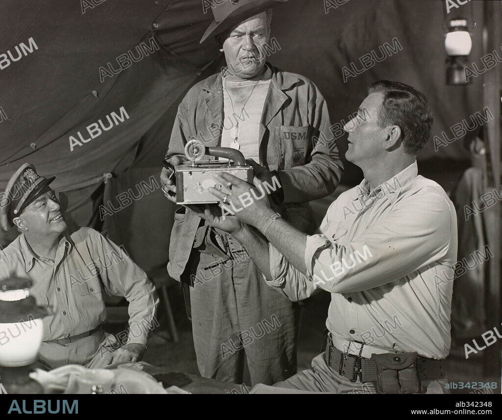 JAY C FLIPPEN, JOHN WAYNE and WILLIAM HARRIGAN in FLYING LEATHERNECKS, 1951, directed by NICHOLAS RAY. Copyright RKO.