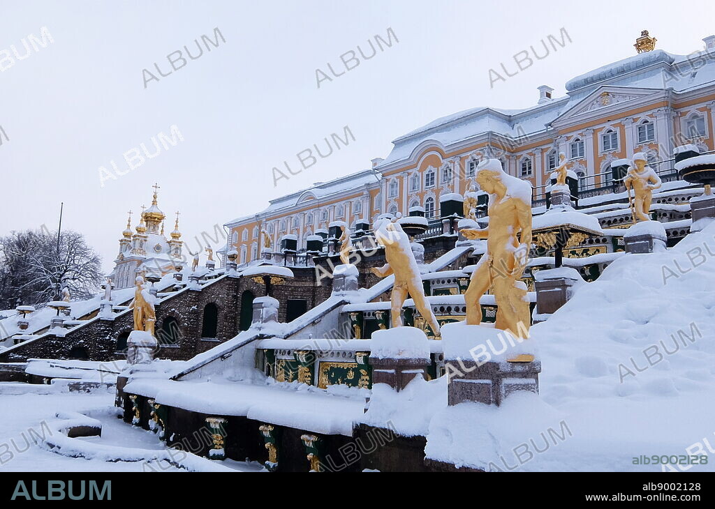Peterhof Palace, a series of palaces and gardens located in Petergof, Saint Petersburg, Russia. Commissioned by Peter the Great as a direct response to his visit to the Palace of Versailles. In the period between 1714 and 1728, the architecture was designed by Domenico Trezzini, and the style he employed became the foundation for the Petrine Baroque style.