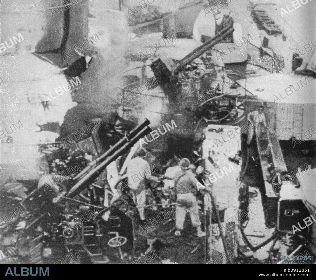 'An Italian battleship is hit. The Warspite scores a direct hit on the Cesare at the extreme range of nearly 15 miles', 1940 (1943). An incident at the Battle of Calabria, fought off the coast of southern Italy on 9 July 1940. HMS 'Warspite' was a Queen Elizabeth-class battleship built for the Royal Navy during the early 1910s. She was involved in several major engagements, including battles in the North Sea and Mediterranean, earning her the most battle honours ever awarded to an individual ship in the Royal Navy and the most awarded for actions during the Second World War. 'Warspite' gained the nickname the Grand Old Lady after a comment made by Admiral Sir Andrew Cunningham in 1943 while she was his flagship. From East of Malta, West of Suez. [His Majesty's Stationery Office, London, 1943].