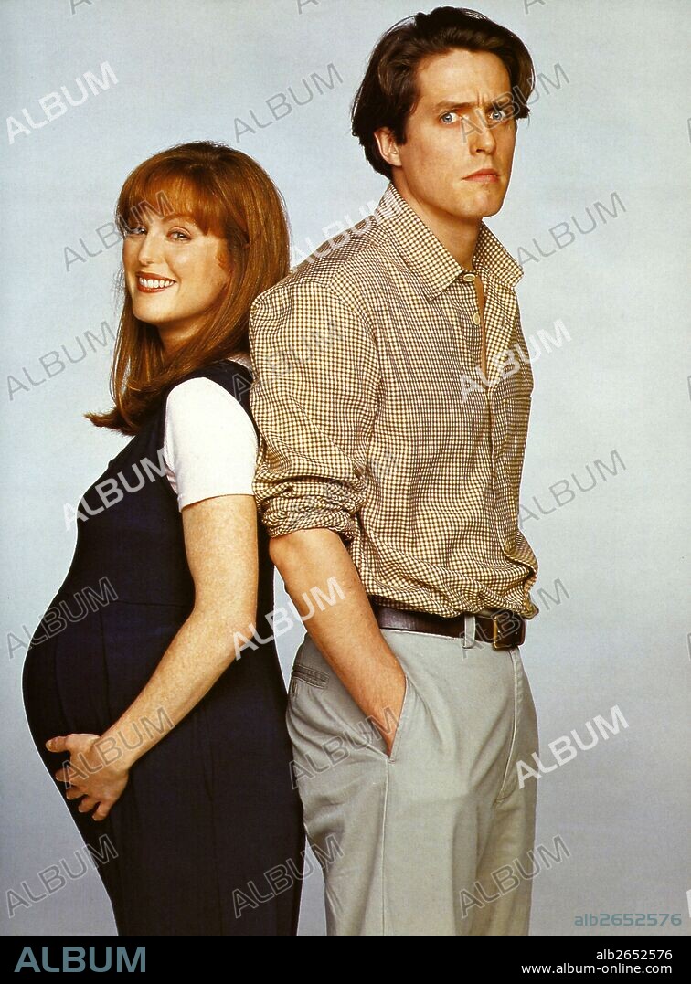 HUGH GRANT y JULIANNE MOORE en NUEVE MESES, 1995 (NINE MONTHS), dirigida por CHRIS COLUMBUS. Copyright 20TH CENTURY FOX.
