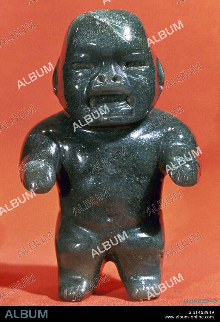 ARTE PRECOLOMBINO. CULTURA OLMECA. Pequeña escultura en jade que representa un enano. Procede de Cerro de las Mesas. Museo de Antropología de México.