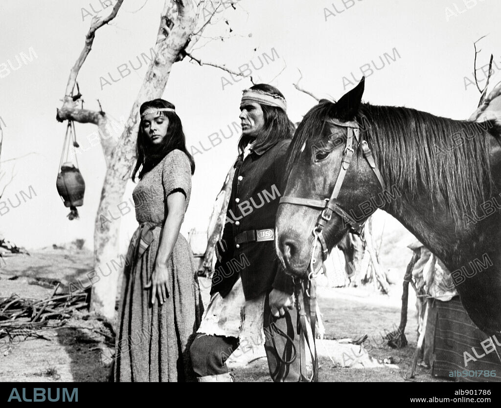 CHARLES BRONSON and JEAN PETERS in APACHE, 1954, directed by ROBERT ALDRICH. Copyright UNITED ARTISTS/HECHT-HILL-LANCASTER.