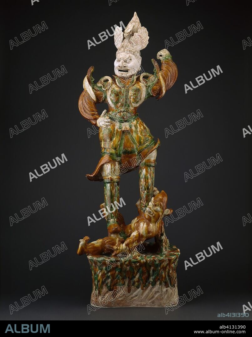 Armored Guardian King (Tianwang) Trampling Demon. China. Date: 701 AD-750 AD. Dimensions: H. 45 in. Earthenware with three color (sancai) lead glazes and traces of pigments. Origin: China.