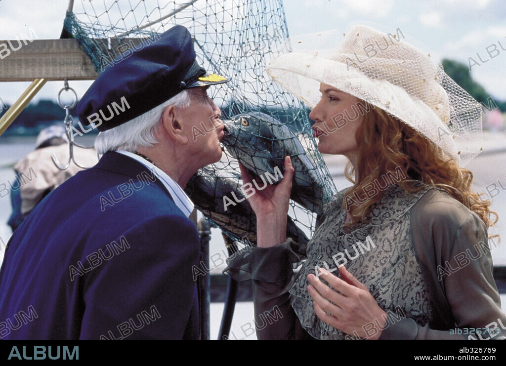 KELLY LYNCH and LESLIE NIELSEN in MR. MAGOO, 1997, directed by STANLEY TONG. Copyright WALT DISNEY PRODUCTIONS.
