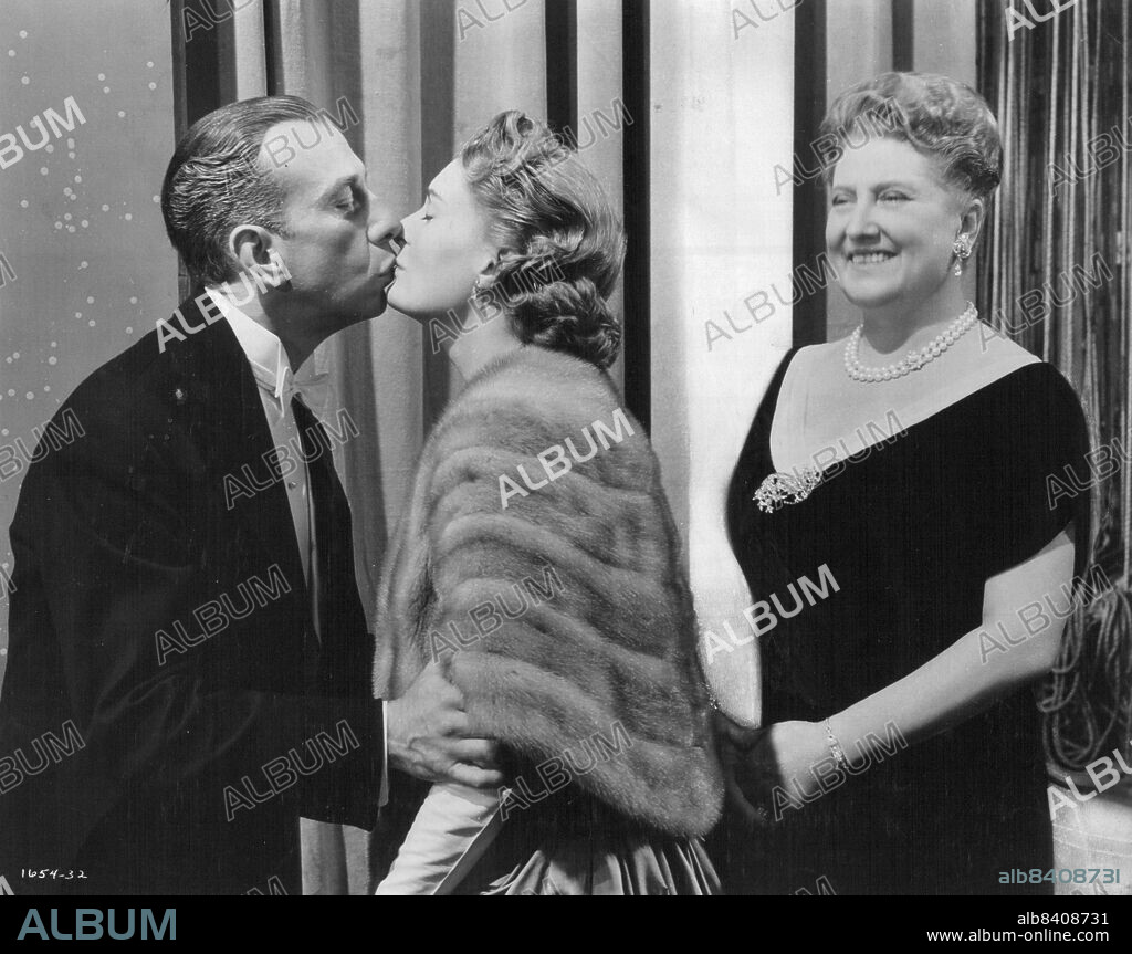 Happy Ending. . . A Kiss for Romberg from his beloved wife. Jose Ferrer is Romberg with Doe Avedon as his wife and Helen Traubel in the role of his devoted friend for M-G-M's all-star musical "Deep In My Heart", based on the life and music or Romberg. Color, Wide-screen musical romance starring Jose Ferrer, Merle ***** Helen Traubel, Walter Pidgeon, and Doe Avedon. The Cast also includes a galaxy of Glamorous guest stars including Rosemary Clooney, Fred And Gene Kelly, Ann Miller Cyd Charisse, James Mitchell, Tony Martin, Jane Powell, Vic Damone, Howard Keel and Joan Weldon. February 12, 1955.