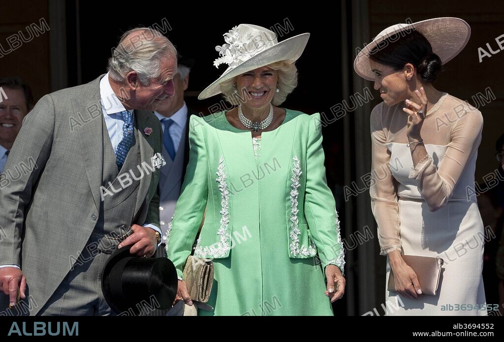 King Charles III, MEGHAN MARKLE and CAMILLA PARKER BOWLES. May 22, 2018 - London, England, United Kingdom - 5/22/18.Prince Charles, Prince of Wales, Camilla, Duchess of Cornwall, Prince Harry, Duke of Sussex and Meghan Markle, Duchess of Sussex at The Prince of Wales'' 70th Birthday Patronage Celebration held at Buckingham Palace in London, England. 22/05/2018