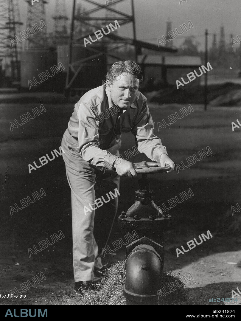 SPENCER TRACY en FRUTO DORADO, 1940 (BOOM TOWN), dirigida por JACK CONWAY. Copyright M.G.M.