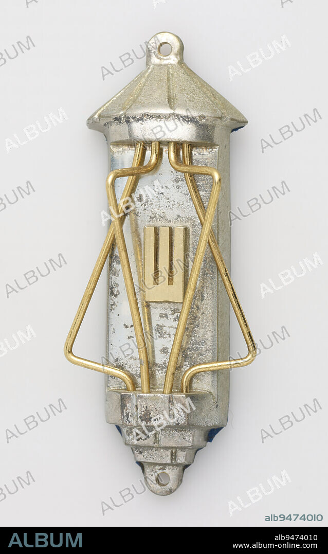 Mezuzah (doorpost), 4 1/2 x 1 7/8 x 11/16 in. (11.43 x 4.76 x 1.75 cm), Metal, United States, The Shema (Deuteronomy 6:4-9) commands, 'And you shall write them on the doorposts of your house and on your gates.' To fulfill this commandment, the Shema is written on a tiny scroll of parchment along with a companion passage, Deut. 11:13-21. The scroll is placed in a case and affixed to the right side of every doorpost at an angle while reciting a special blessing. This mezuzah is from the Metropolitan-Mount Sinai Medical Center, which closed in 1991.