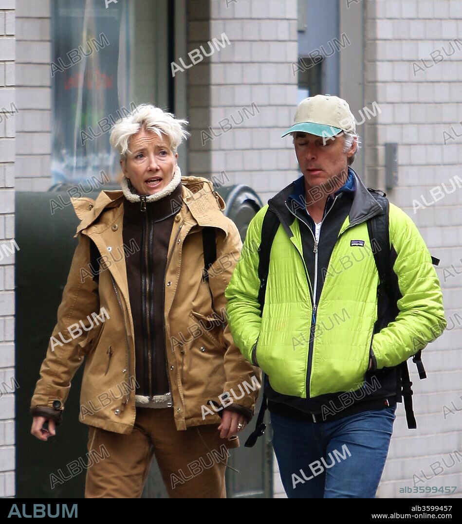 April 17, 2018 - New York, New York, United States - Actress Emma Thompson bundles up against the chilly spring weather as she walks in the West Village with her husband actor Greg Wise on April 17 2018 in New York City. 17/04/2018