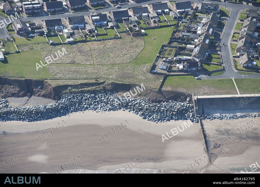 Sea wall and coastal defences, Withernsea, East Riding of Yorkshire, 2014. Aerial view showing coastal defences against erosion near Oak Avenue.