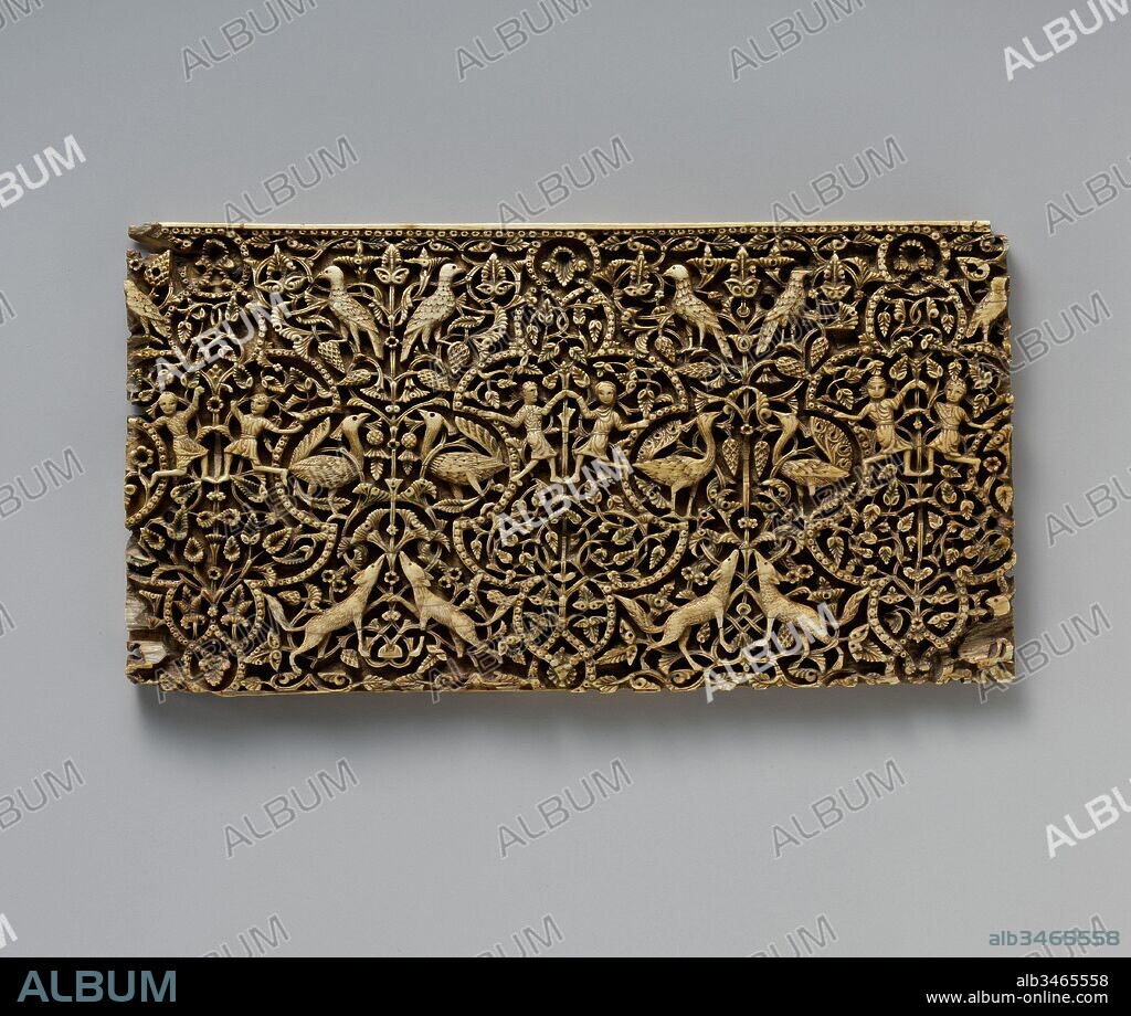 Panel from a Rectangular Box, 10th–early 11th century, Made in Spain, probably Cordoba, Ivory; carved, inlaid with stone with traces of pigment, H. 4 1/4 in. (10.8 cm), Ivories and Bone, This panel, carved from a single piece of ivory in a twice-repeating pattern, once adorned the side of a rectangular casket. The complexity of its decoration as well as the attention to details, such as the eyes of humans and animals, which were drilled and filled with minute quartz stones, demonstrate the refinement and the accomplishment of the caliphal ivory-carving workshop.