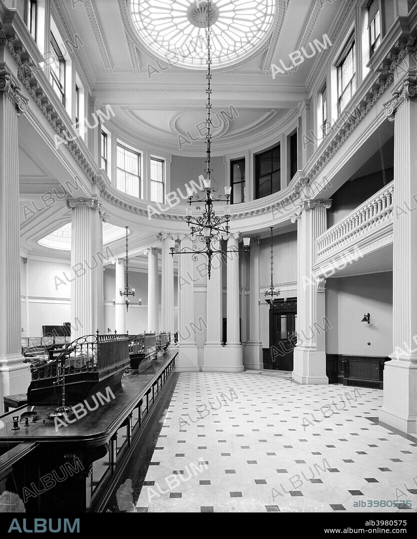 Interior of Coutts & Co bank, 440 The Strand, Westminster, London. The bank was first established in 1692 by John Campbell. It became known as Coutts & Co in 1822 after James Coutt, a partner from 1755 onwards. It moved to its present address in 1904, and the building was designed by MacVicar Anderson; it was redeveloped by Frederick Gibberd in 1973-1978. The bank has had close links to the Royal Family since 1716 and has held an account for every British sovereign since George III (1738-1820).