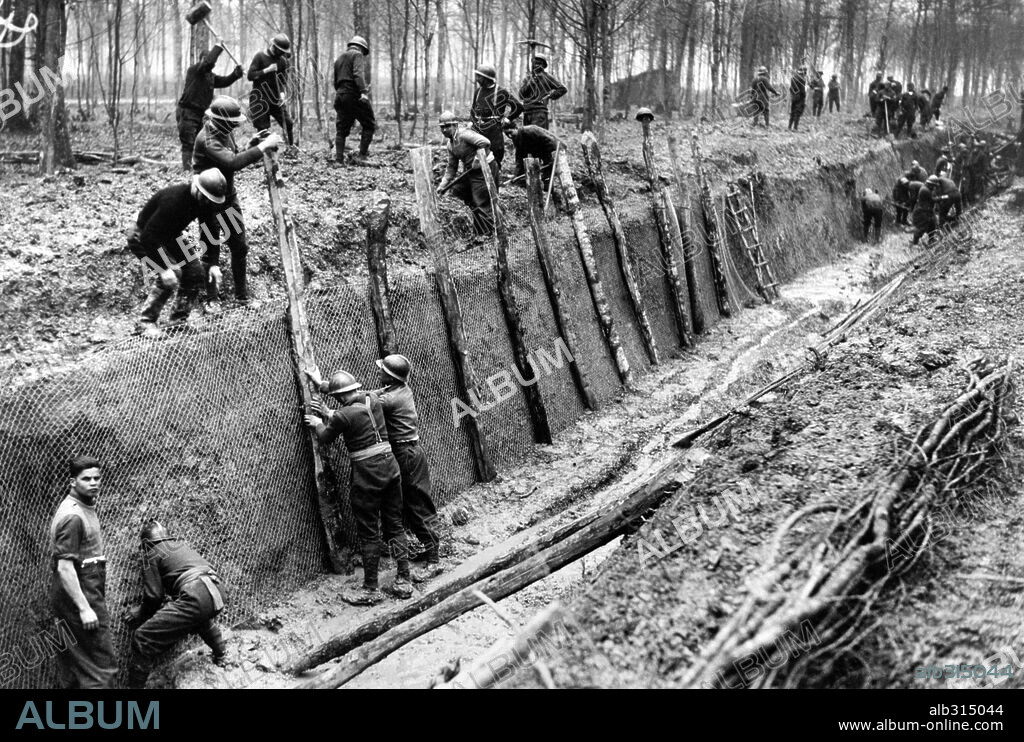 French troops constructing anti-tank ditches along the Maginot line (France). March 1940.