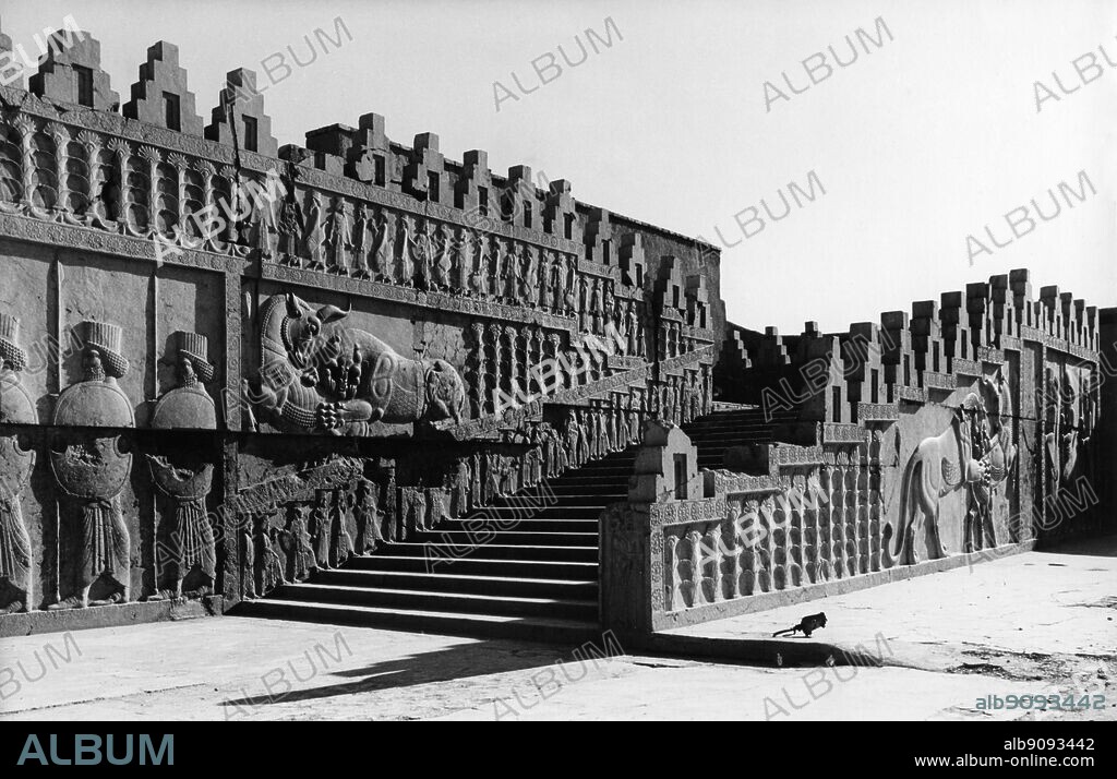 Apadana Palace , Persepolis : Ancient city of Persia , capital of the Persian Empire , founded by Darius . Near to modern Shiraz , Iran . The Walls were tiled and decorated with pictures of lions , bulls , and flowers.