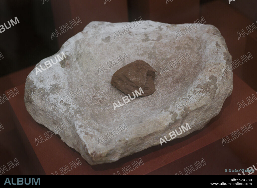 Utensil made of stone in the shape of a shell. Possibly used as a ladle. Xaghra Stone Circle. Neolithic. Xaghra, Gozo Island, Malta. Gozo Museum of Archaeology. Cittadela of Victoria in Gozo. Malta.