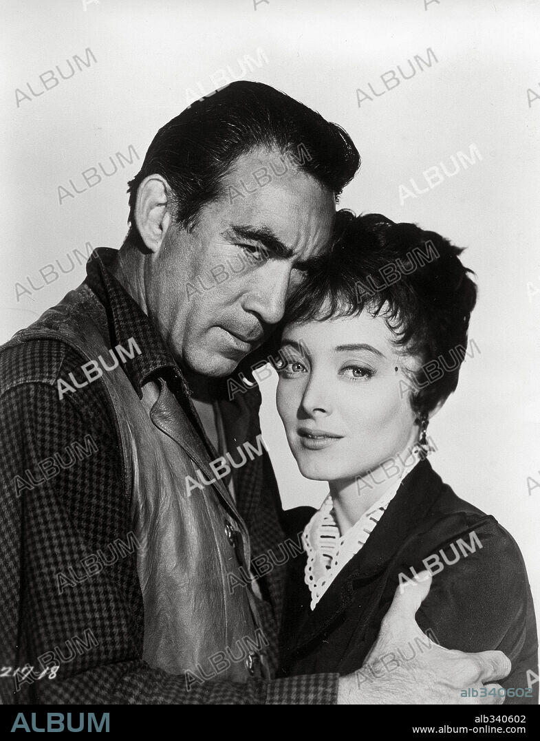 ANTHONY QUINN and CAROLYN JONES in LAST TRAIN FROM GUN HILL, 1959, directed by JOHN STURGES. Copyright PARAMOUNT PICTURES.