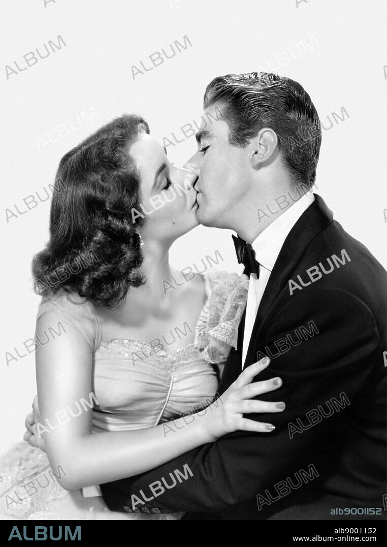 ELIZABETH TAYLOR and PETER LAWFORD in JULIA MISBEHAVES, 1948, directed by JACK CONWAY. Copyright M.G.M.