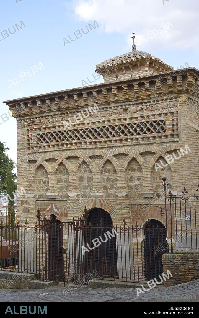 Toledo, Spain. Cristo de la Luz Shrine. Former mosque, built at the end of the 10th century and converted into a Christian church in the 12th century. Main facade, facing west. Built in brick with interlaced blind horseshoe arches, frieze with sebka decoration and topped by a cornice of corbels.