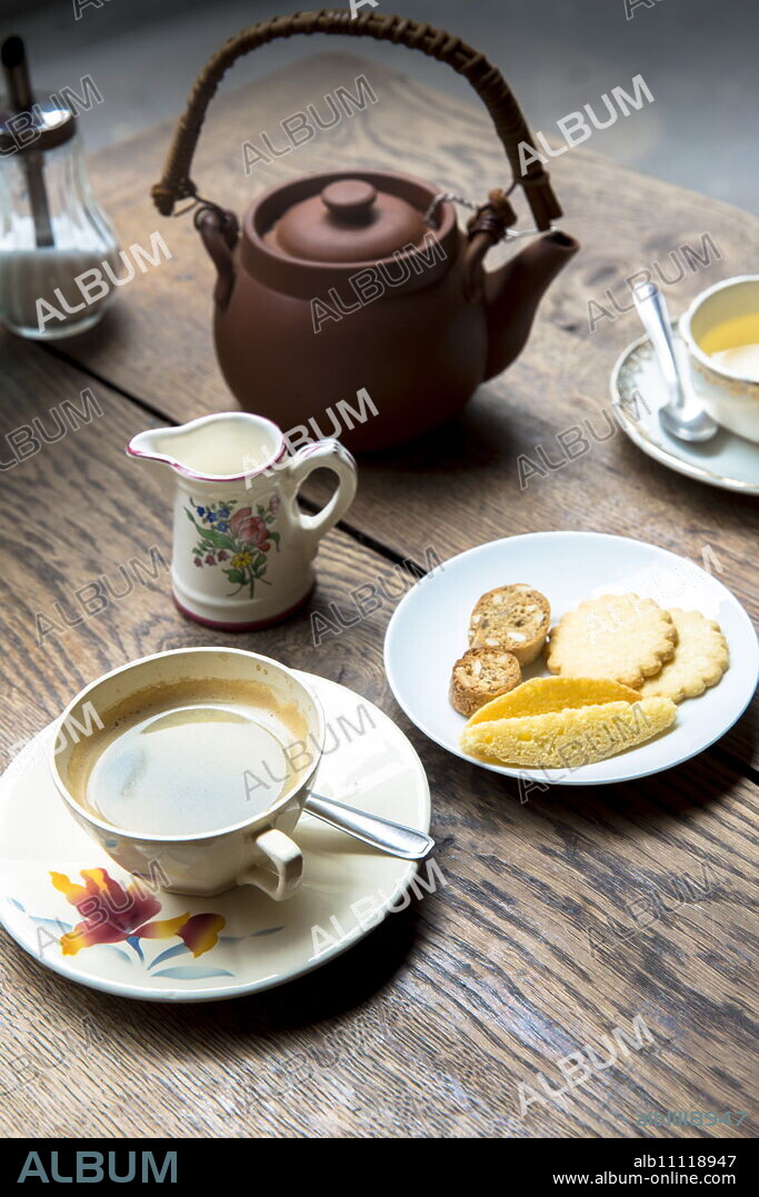 Coffee and biscuits at cafe La Rose de Vergy in Rue de la Chouette in Dijon in the Burgundy regio, France, Europe.