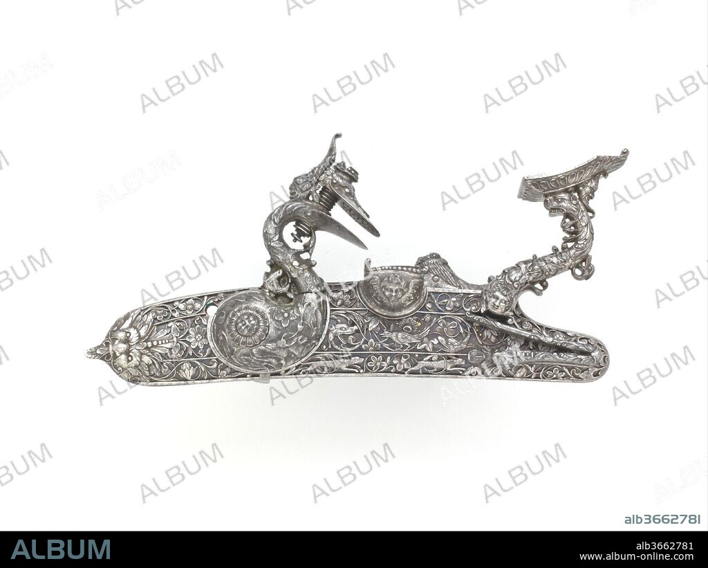 Detached Flintlock alla Fiorentina. Culture: Italian, Bargi. Dimensions: H. 2 3/4 in. (7.0 cm); W. 5 3/4 in. (14.6 cm). Gunsmith: Sebastiano Cecchi, called Acquafresca (Italian, Bargi, 1619-1692); or Matteo Cecchi, called Acquafresca (Italian, Bargi, 1651-1738). Date: dated 1679.
This lock is the earliest dated piece by the Acquafresca, father and son, who were celebrated gunsmiths and masters of chiseling and engraving steel. Their patrons included members of the Medici court in Florence.