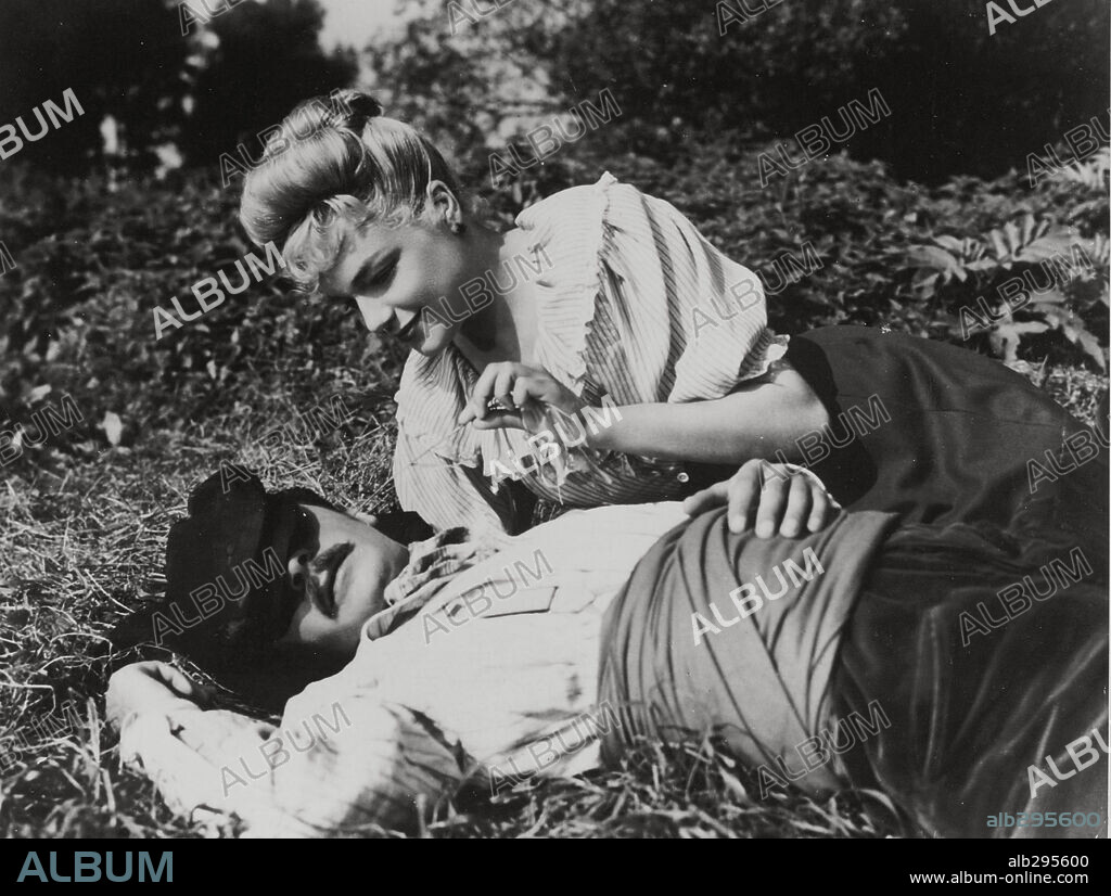 SERGE REGGIANI et SIMONE SIGNORET dans CASQUE D'OR, 1952, réalisé par JACQUES BECKER. Copyright SPEVA FILMS/PARIS FILM.