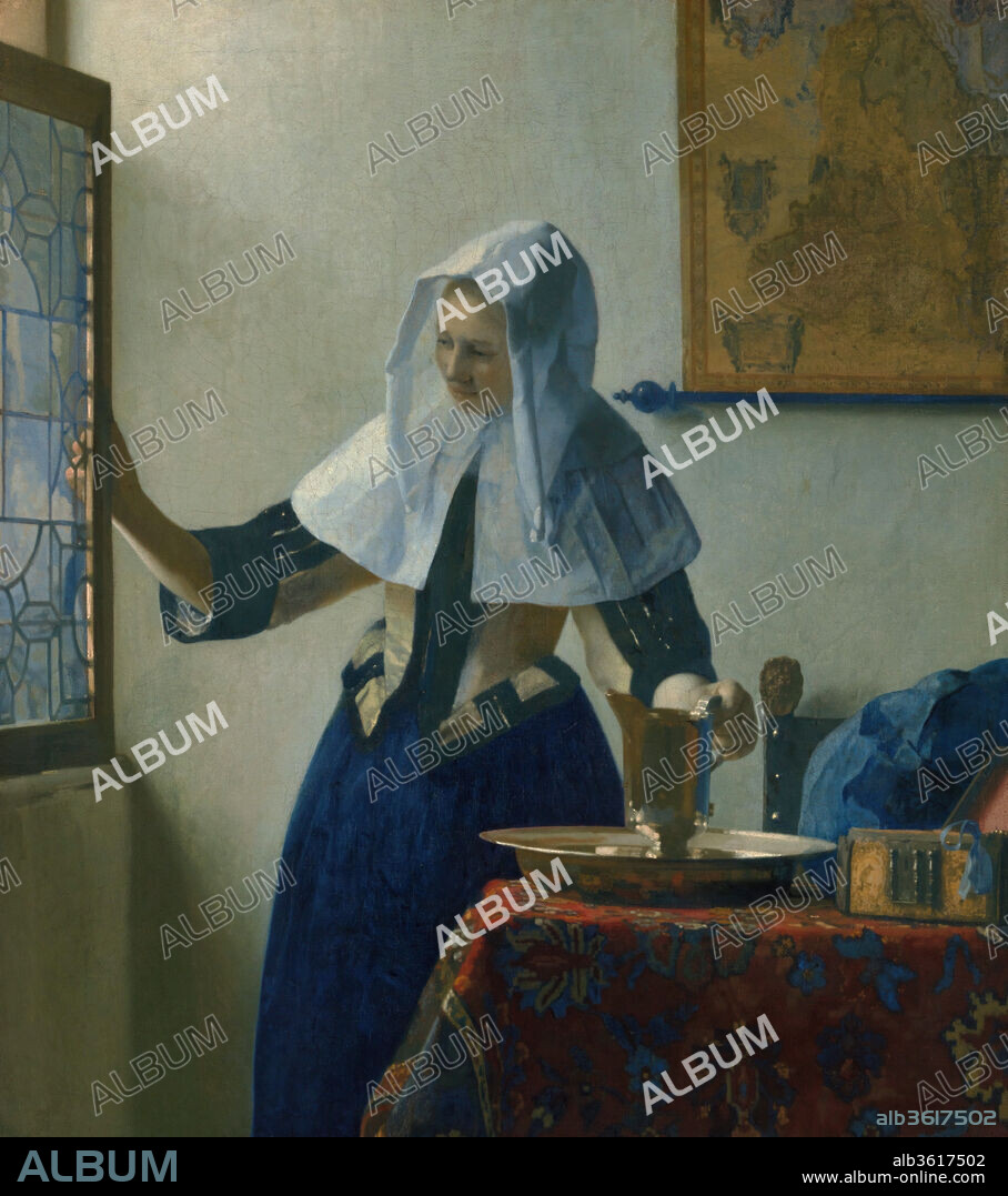 JAN VERMEER. Young Woman with a Water Pitcher. Artist: Johannes Vermeer (Dutch, Delft 1632-1675 Delft). Dimensions: 18 x 16 in. (45.7 x 40.6 cm). Date: ca. 1662.
The essential subject of this serene picture is an ideal woman in an ideal home. Her head and elegant costume are covered by linen scarves, which with the silver-gilt basin and pitcher and the open window suggest ablutions at the beginning of the day. A string of pearls emerges from the jewelry box. Balanced shapes and colors (mainly the primaries) enhance the harmonious mood. Works by Vermeer were newly known and coveted by American collectors of the Gilded Age: this canvas was the first of thirteen to enter the United States between 1887 and 1919.