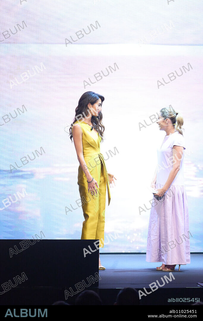 Amal Clooney, Ainhoa Arbizu attends 'We Choose Earth Tour' event at EDP Theatre on June 22, 2023 in Madrid, Spain.