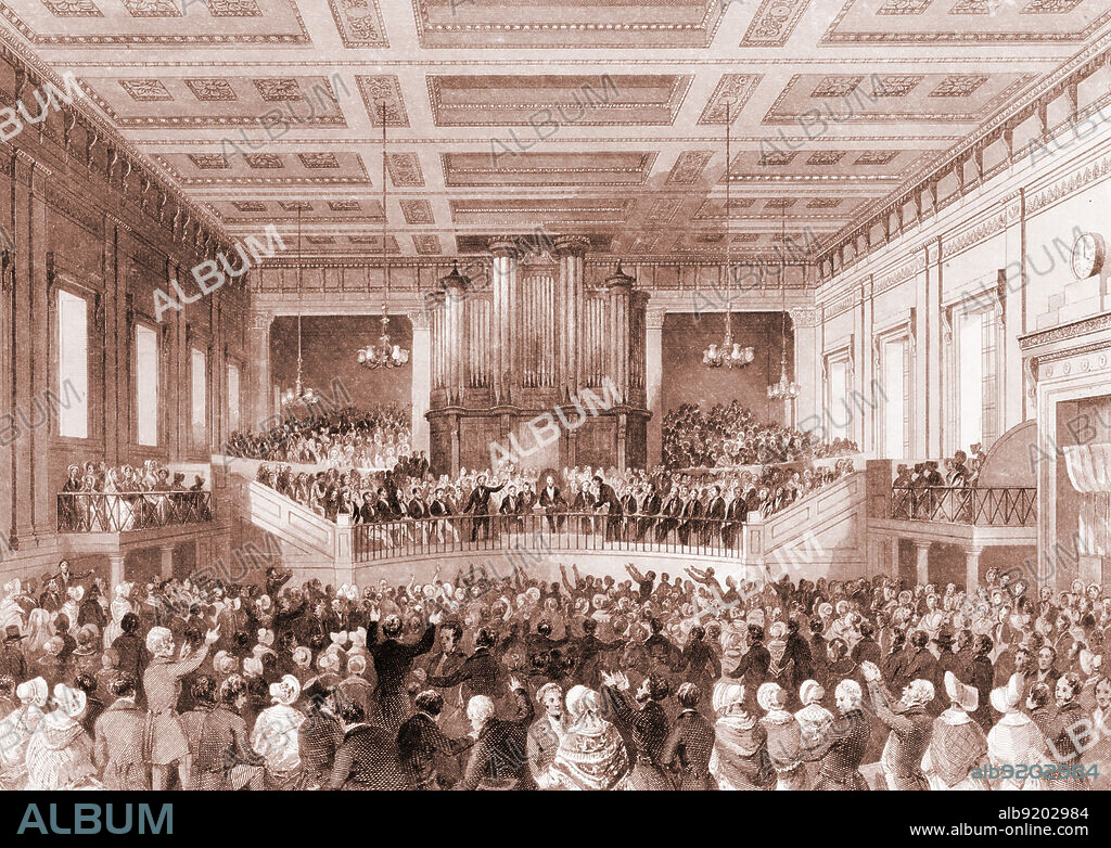 The first World Anti-Slavery Convention, held in Exeter Hall, in London, England on 12-23 June 1840. The fact that women could not vote or speak at this event prompted the start the women's suffrage movement in the United States. Engraved by Henry Melville after Thomas Shepherd, 1841.