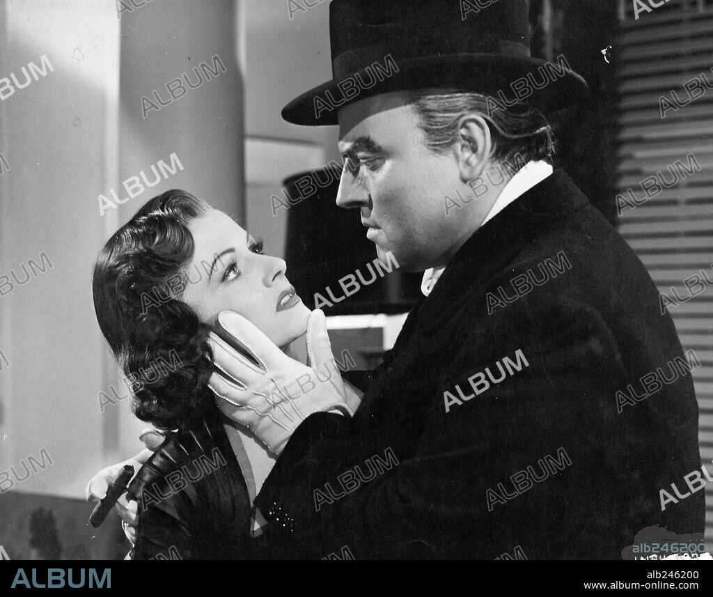 MARGARET LOCKWOOD y ORSON WELLES en EL ENIGMA DE MANDERSON, 1952 (TRENT'S LAST CASE). Copyright BRITISH LION.