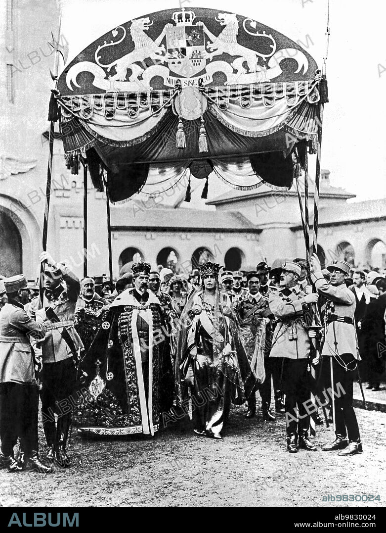 Bucharest, Romania October 29, 1922, The newly crowned King Ferdinand and Queen Marie under the canopy just after the coronation ceremony. World War I had prevented the crowning after the death of King Carol in 1914.