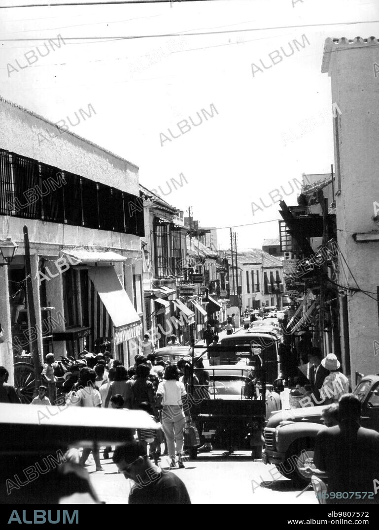 1962. San Miguel street, the main street in Torremolinos (Málaga) where there is a Crossroads of People of All Races and Languages.