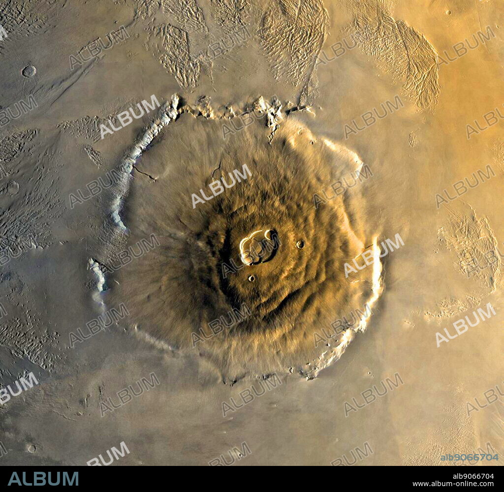 Olympus Mons, the largest volcano in the solar system, is also known as Nix Olympica, Olympus Mons is a very large shield volcano on the planet Mars. By one measure, it has a height of nearly 22 km (13.6 mi).