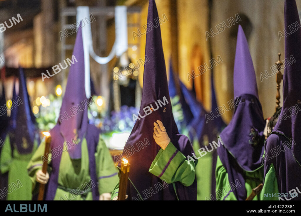 Hooded brothers with conical hats that serve as masks, Holy Week procession, Llucmajor, Mallorca, Balearic Islands, Spain.