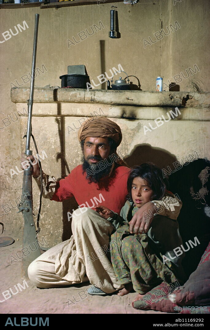 Pathan man and daughter near Ziarat, Pakistan, Asia.