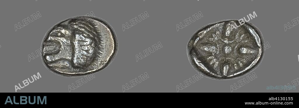 ANCIENT ROMAN. Diobol (Coin) Depicting a Lion. Greek, minted in Miletus, Ionia. Date: 500 BC-450 BC. Dimensions: Diam. 1.1 cm; 1.20 g. Silver. Origin: Roman Empire.