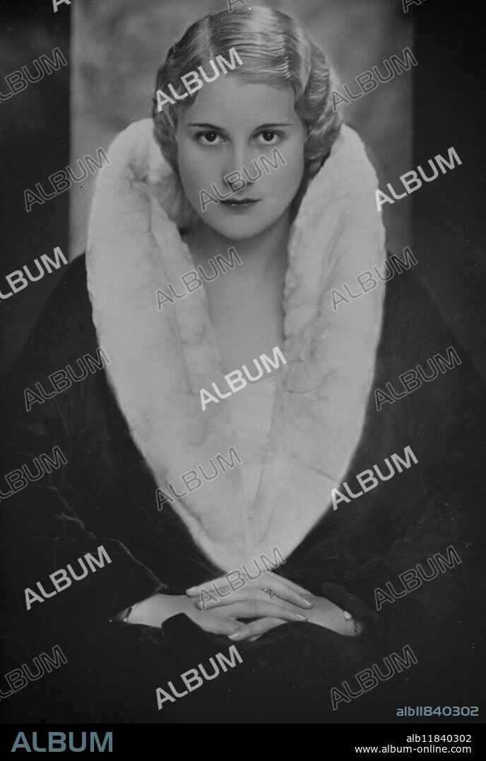 King ' s wife for a day . Mme Traute Klose , an 18 year old Austrian girl who is taking the principal part in an extraordinary film now being produced by the French Algra company , in Vienna , called ' Good King Pausole '. November 1932.