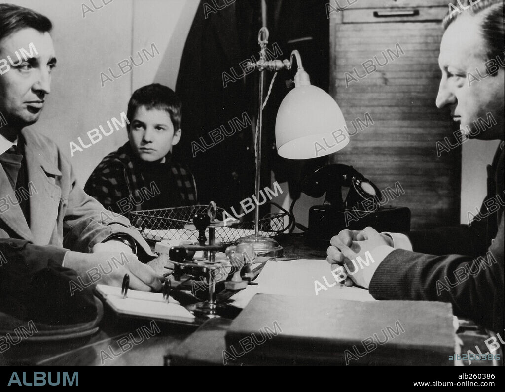 ALBERT REMY and JEAN-PIERRE LEAUD in THE FOUR HUNDRED BLOWS, 1959 (LES QUATRE CENTS COUPS), directed by FRANCOIS TRUFFAUT. Copyright SEDIF, LES FILMS DU CAROSSE/JANUS.