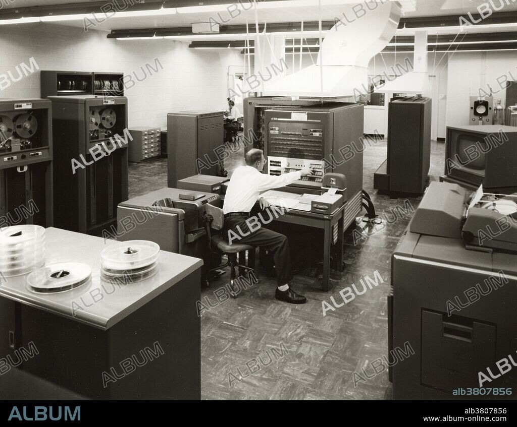 The IBM 701, known as the Defense Calculator while in development, was announced to the public on April 29, 1952, and was IBM's first commercial scientific computer. In June 1954, the first of two IBM 701s arrived at Lawrence Livermore National Laboratory The IBM 701 had a 4,096-word memory, each word being 36-bits; equivalent to almost 12 decimal digits. The parallel feature meant the machine did most of its internal operations including arithmetical on whole words and much faster than the Lab's UNIVAC. According to computation pioneer George Michael, however, the machine "freely made mistakes, but never reported them." Input for the 701 was prepared on a keypunch and entered through a card reader. No photographer credited, circa 1950s.