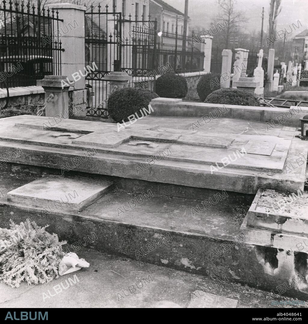 Grave of Gavrilo Princip, Sarajevo cemetery, Bosnia-Hercegovina, Yugoslavia, 1939. Gavrilo Princip (1894-1918), a Yugoslav nationalist, assassinated Archduke Franz Ferdinand of Austria in Sarajevo on 28 June 1914, setting in motion the chain of events that would lead to the outbreak of the First World War. Princip unsuccessfully attempted to commit suicide after the assassination and was captured by the authorities. As he was under the age of 20, he was too young to receive the death penalty and was therefore sentenced to 20 years in prison, the maximum sentence. Princip contracted tuberculosis while in jail and died in 1918.